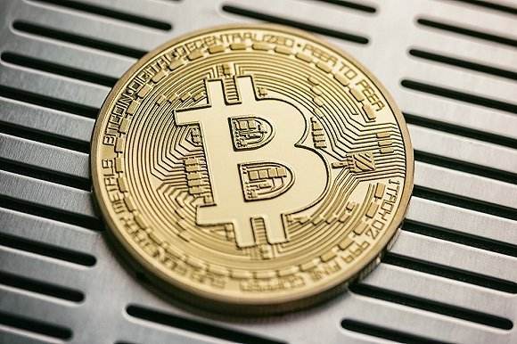 比特币老师喊单骗局